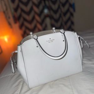 White Kate Spade Handbag w/ tags attached.